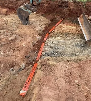 Trench dug across a paddock for an underground submains cable in Bindoon, by OWCA Electrical